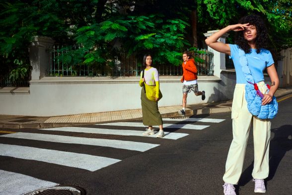 Pedestrians stood in the street.